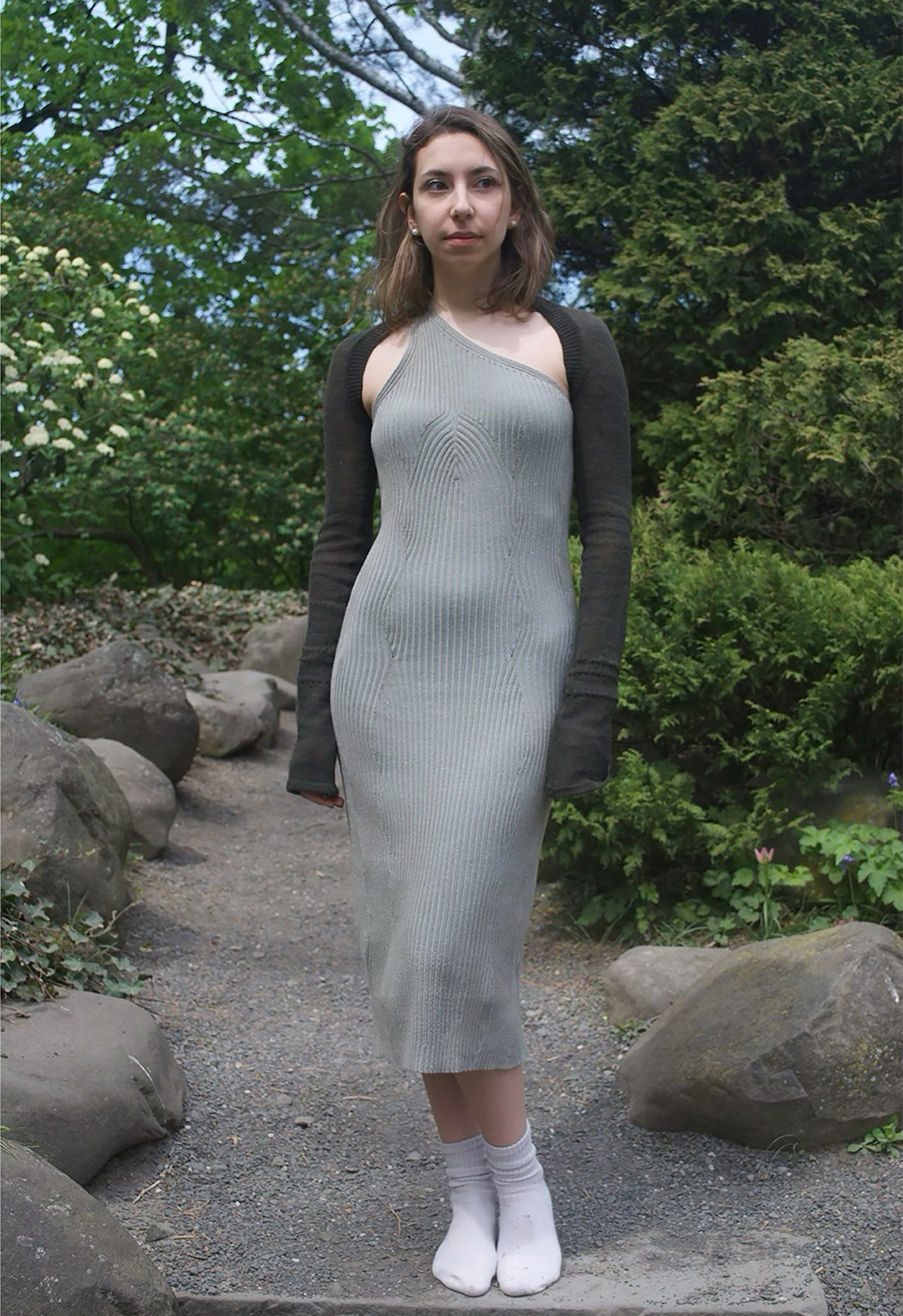 The photo shows a full front view of the dress worn with the shrug.